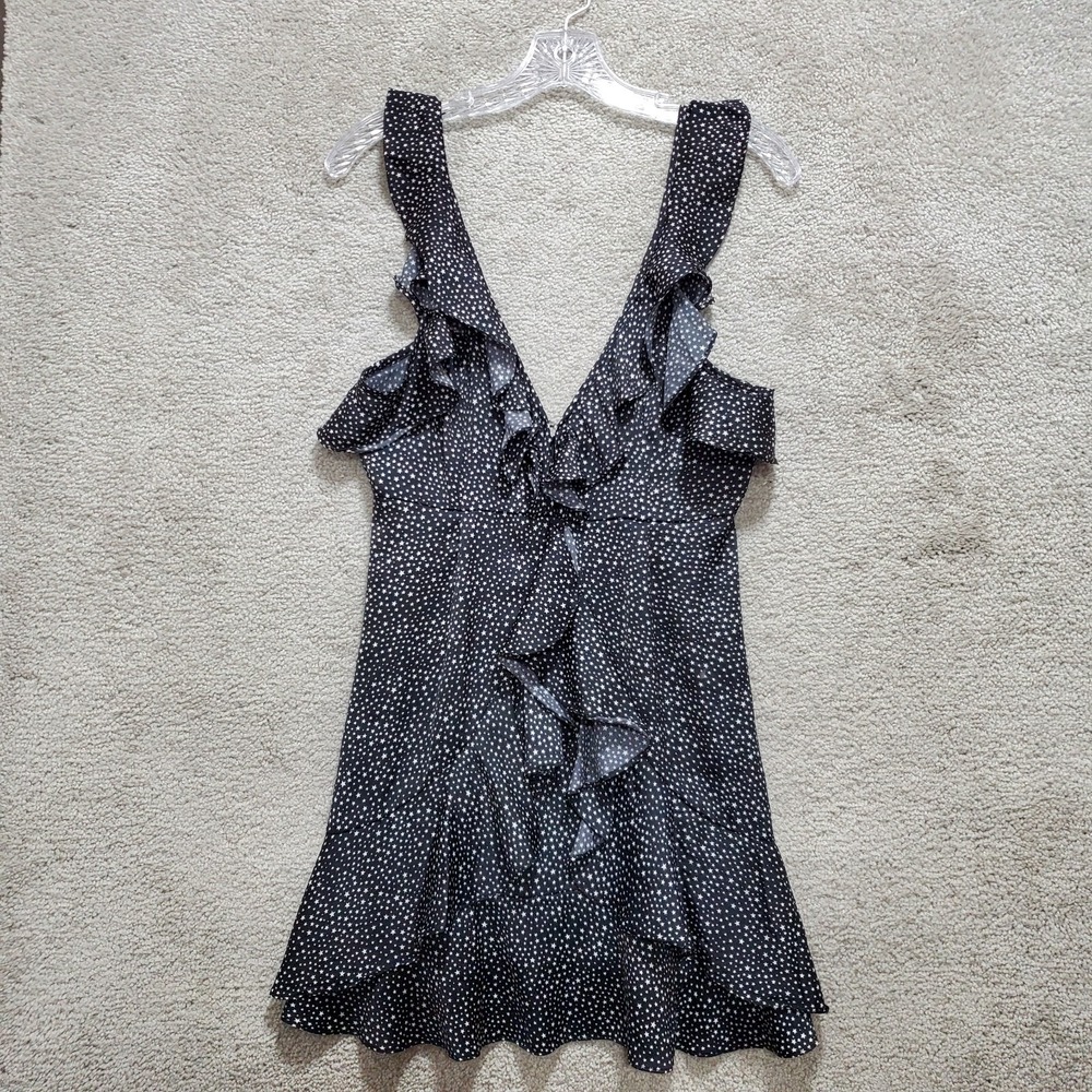 A World Away Mini Dress Women's Small Black Star Print Ruffle Front Open Back